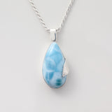 Larimar Pendant Flora complemented by a delicate silver leaf detail