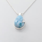 Larimar Pendant Flora complemented by a delicate silver leaf detail