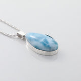 Larimar Pendant Flora complemented by a delicate silver leaf detail