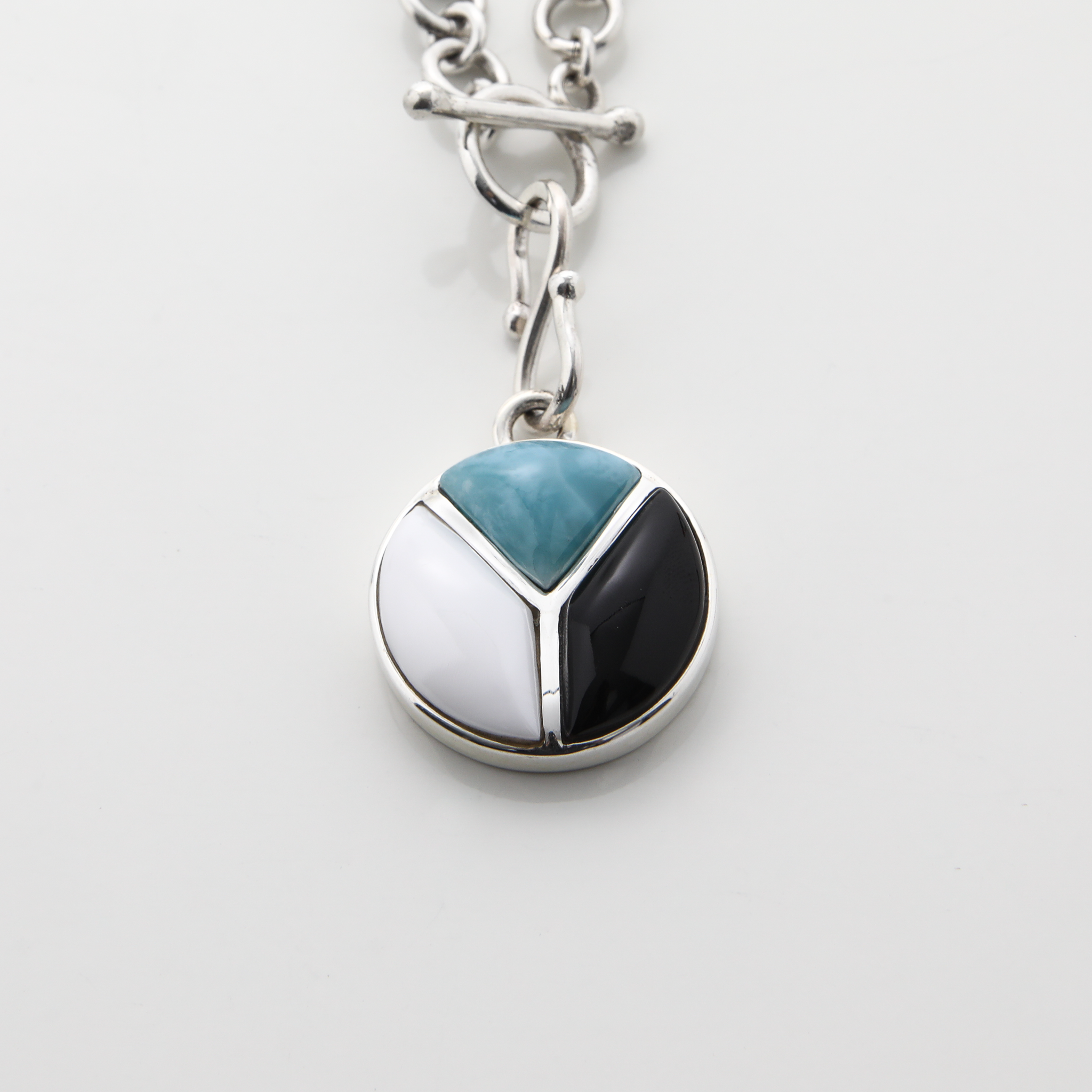 Pearl and Cow Horn Charm
