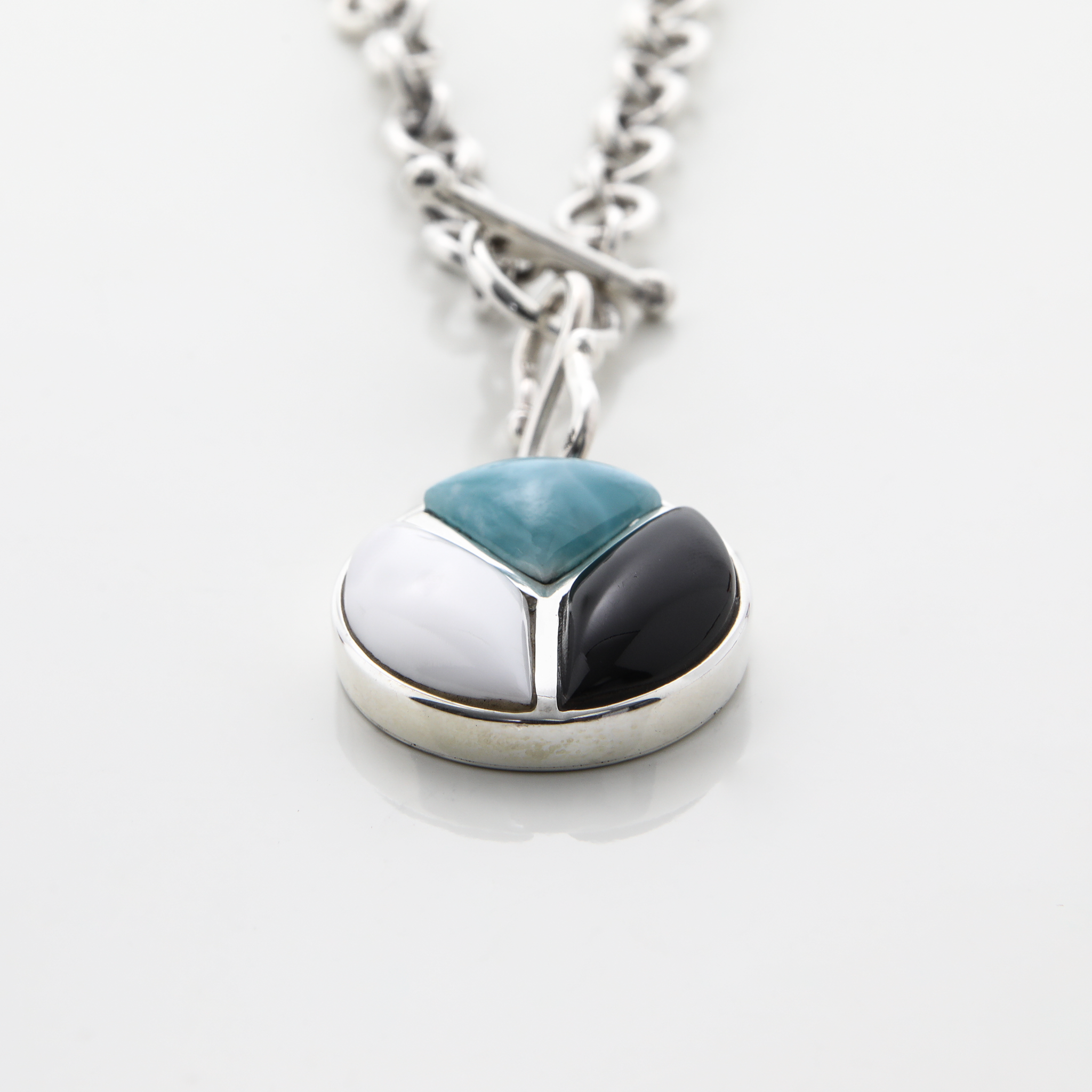 Pearl and Cow Horn Charm