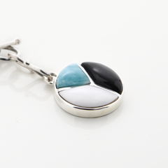 Pearl and Cow Horn Charm
