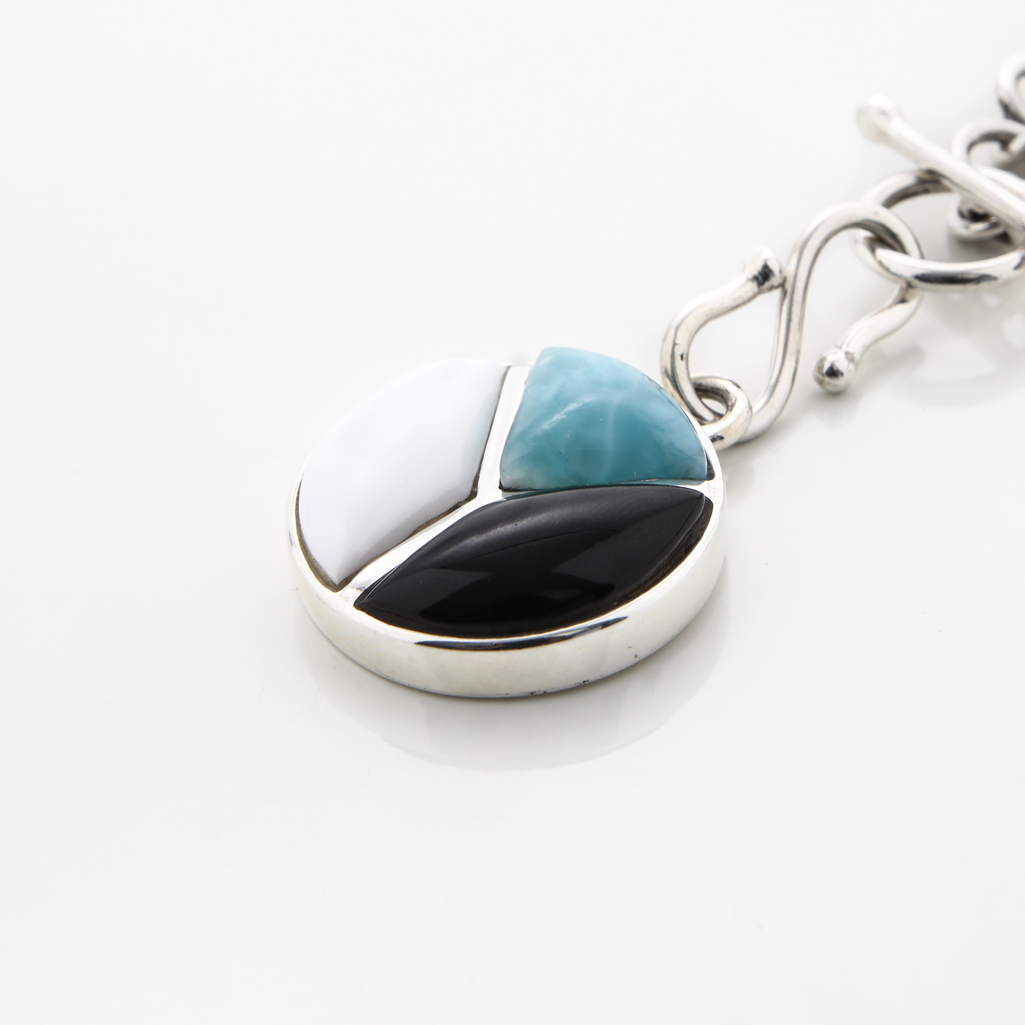 Pearl and Cow Horn Charm
