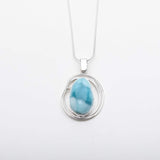 Larimar Oval Pendant, Génesis