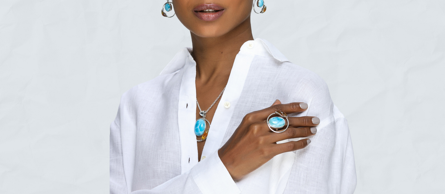 Larimar gemstones and Amber in a beautiful combination, set in silver and gold you'll love it. Artisan made by Dominicans.