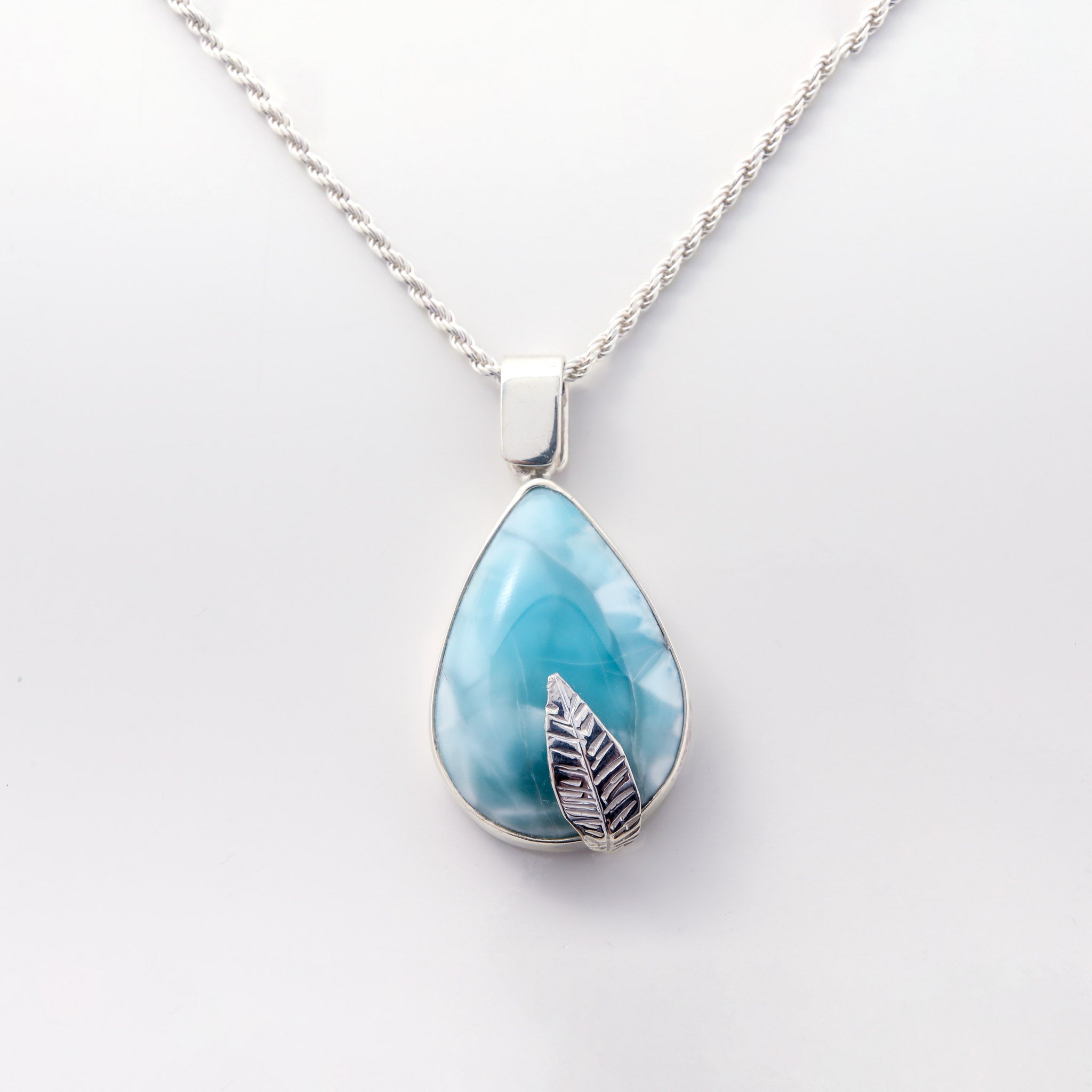 Larimar pendant featuring a silver leaf detail Valora