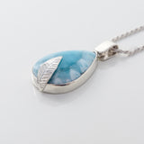 Larimar pendant featuring a silver leaf detail Valora