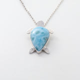 Larimar Pendant Lyric. This unique necklace features a charming turtle pendant made from the mesmerizing Larimar stone.