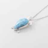 Larimar Pendant Lyric. This unique necklace features a charming turtle pendant made from the mesmerizing Larimar stone.