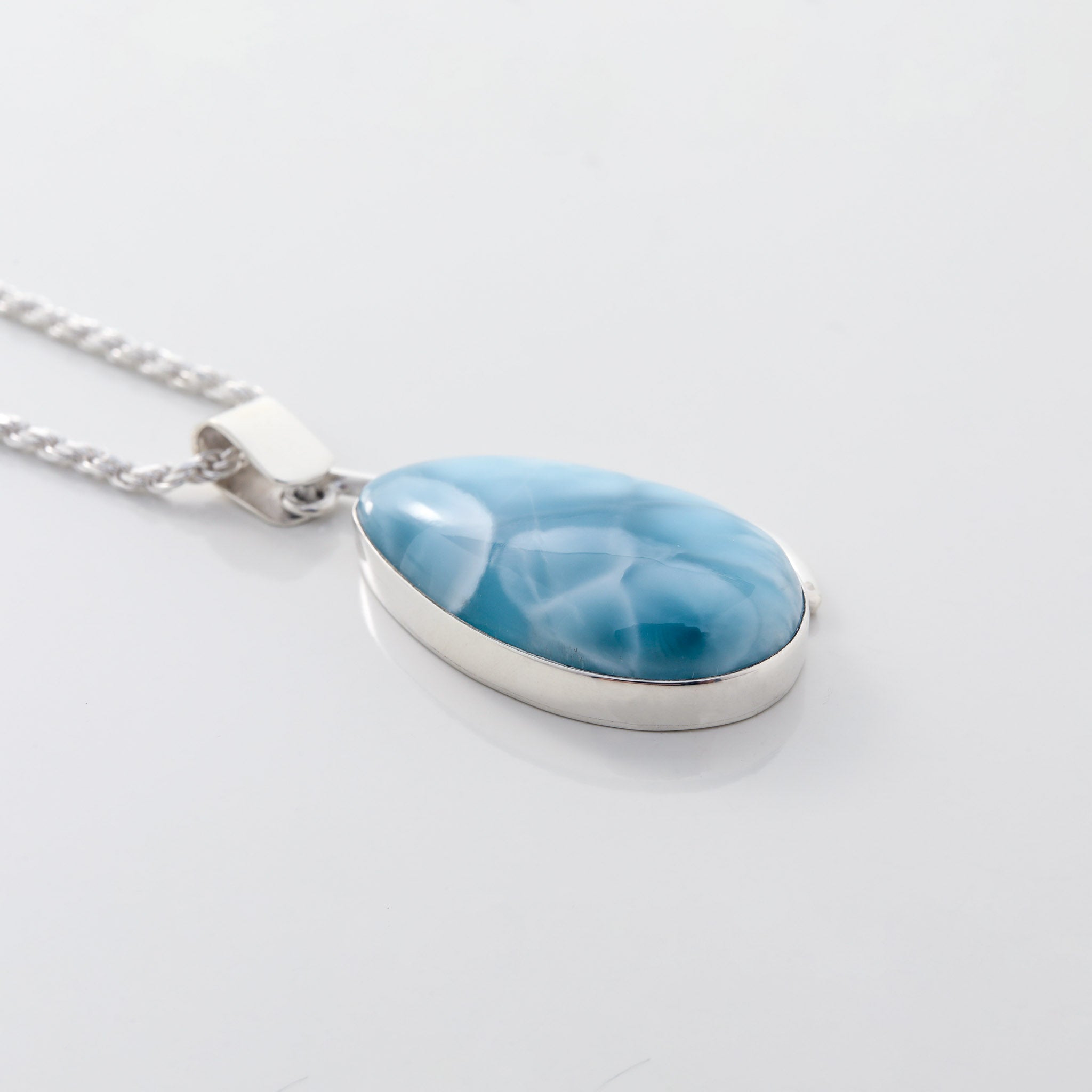 Larimar stone with graceful wavy detailing Pendant