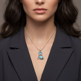 Women wearing a cat shape Larimar pendant