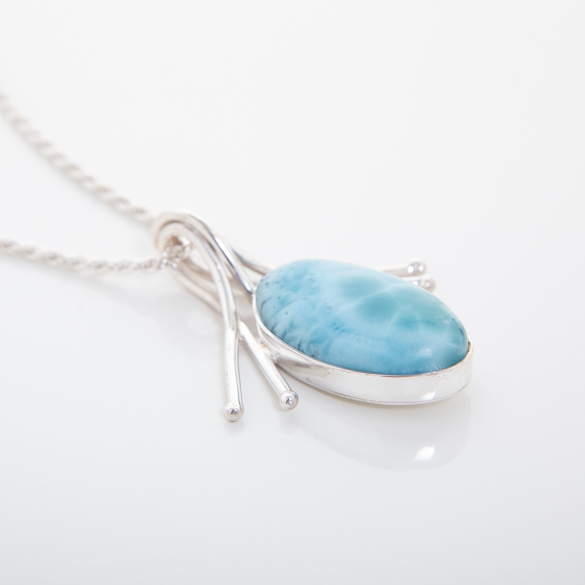 Meet the Carol pendant. Its gorgeous Larimar blue patterns sets it apart from the rest, adding a dash of class to your collection. A must-have for any fashion-forward individual, this timeless piece is sure to leave a lasting impression.