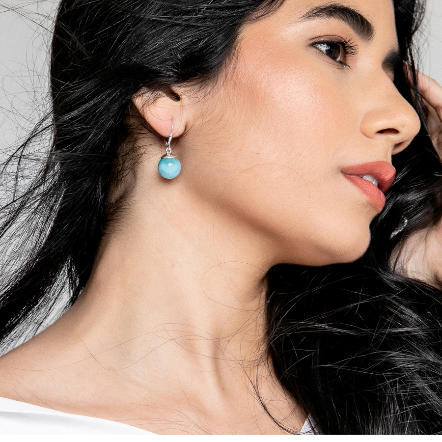 These larimar round bead dangle earrings are the perfect combination of beauty and functionality. The lightweight design makes them comfortable to wear all day long, while the stunning larimar stones add a touch of elegance and style.