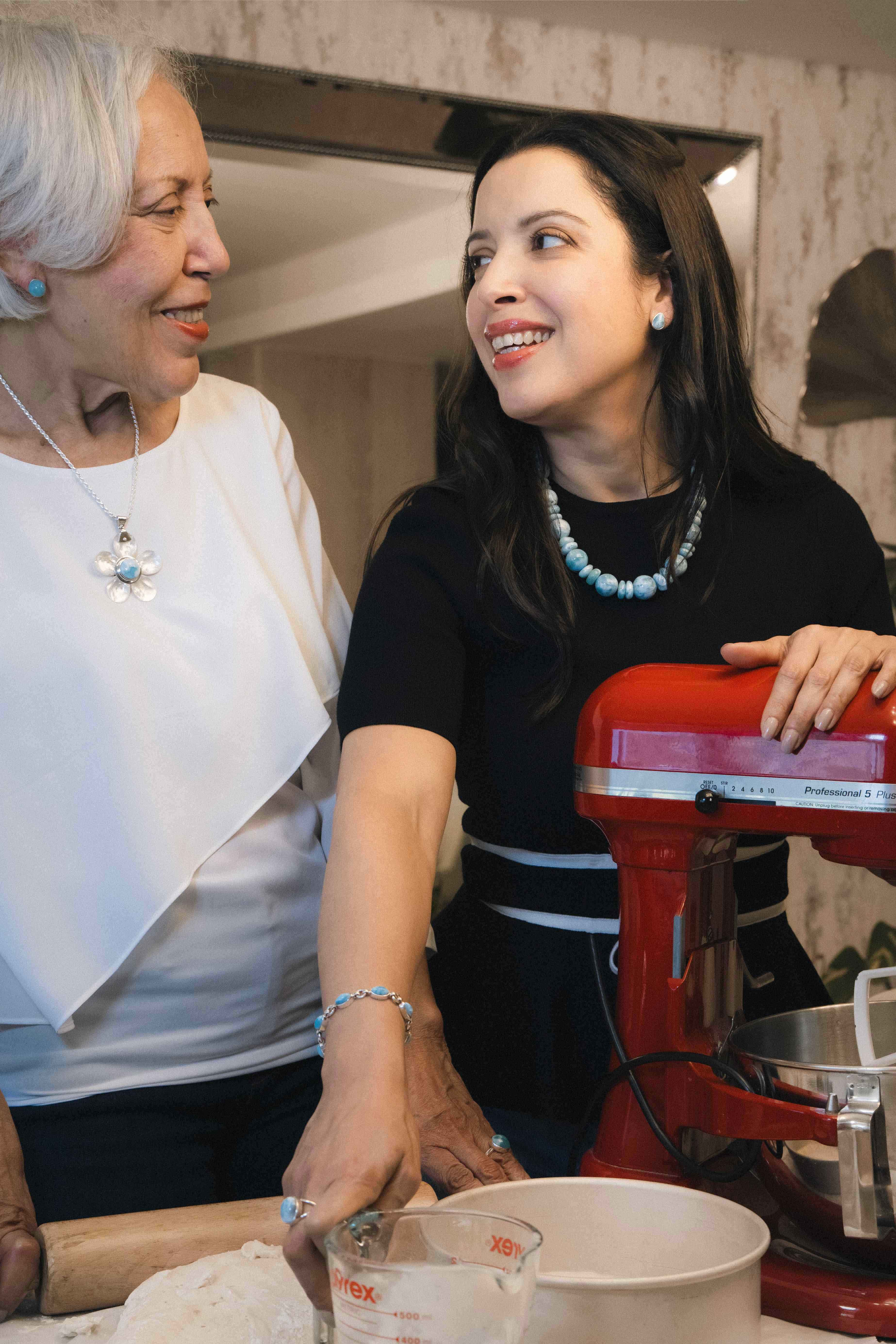Mother’s Day gift idea featuring handcrafted Larimar jewelry from the Dominican Republic, styled for a warm, intimate moment between mother and daughter