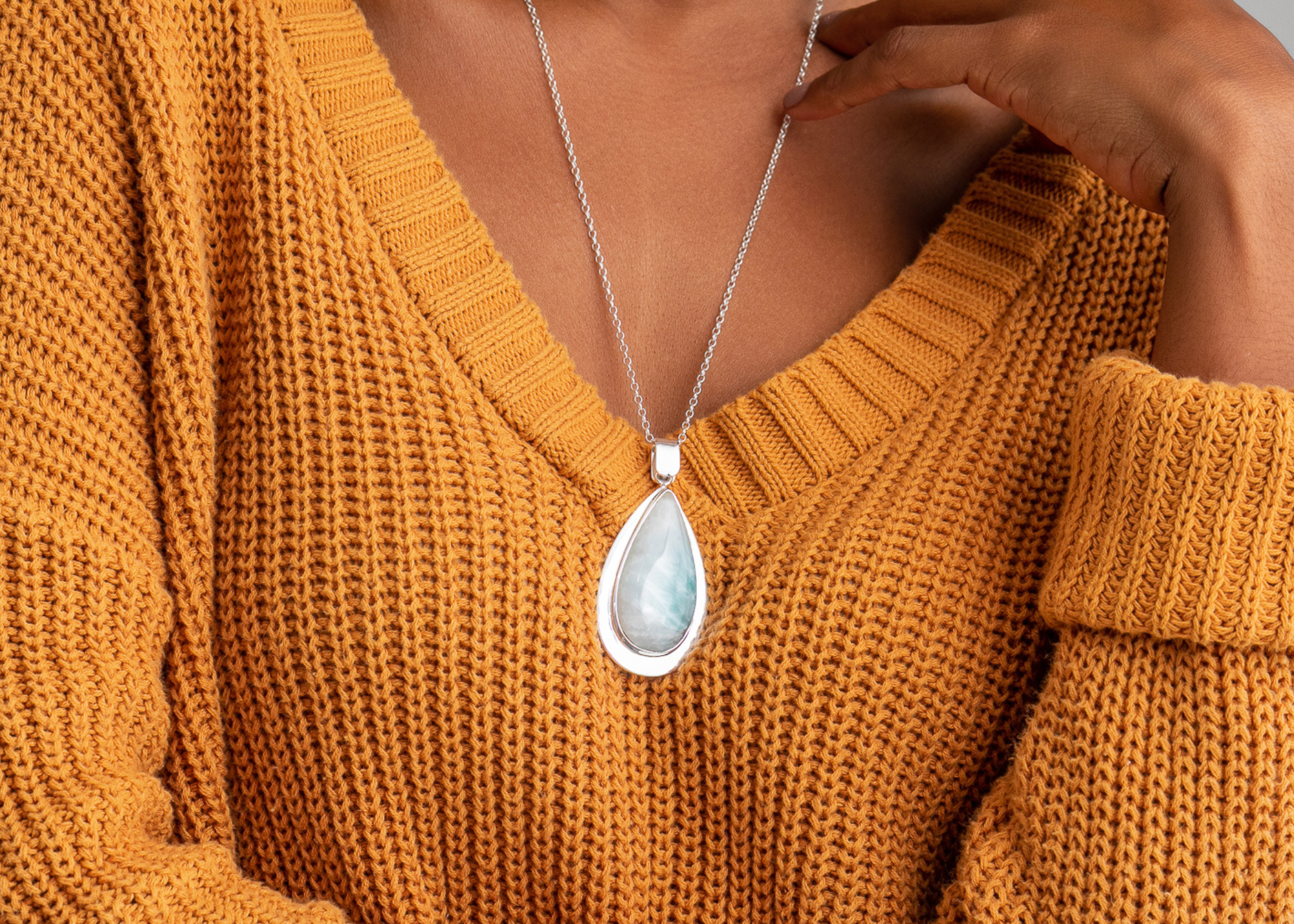 White Larimar pendants and necklaces for sale.