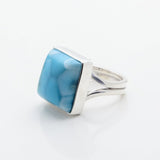 Larimar Silver ring with a blue stone on a white background