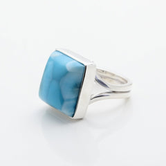 Larimar Silver ring with a blue stone on a white background