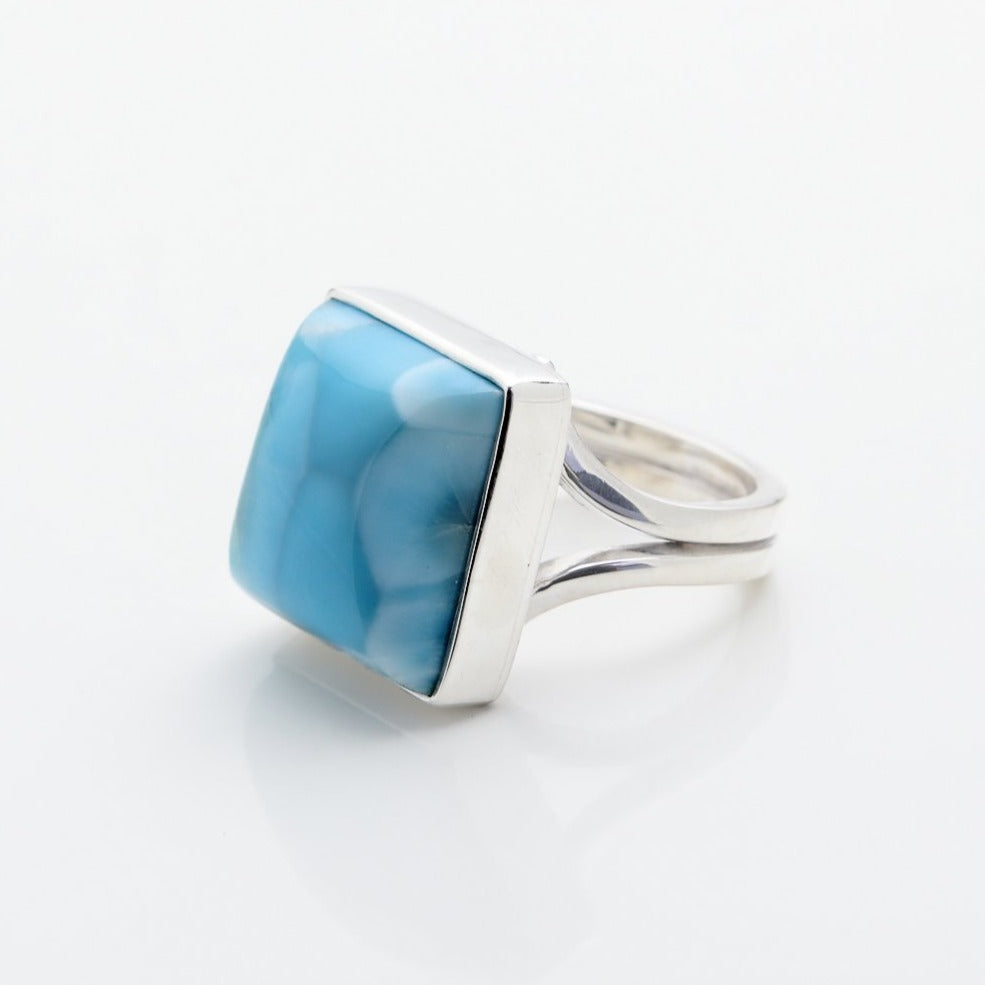 Larimar Silver ring with a blue stone on a white background